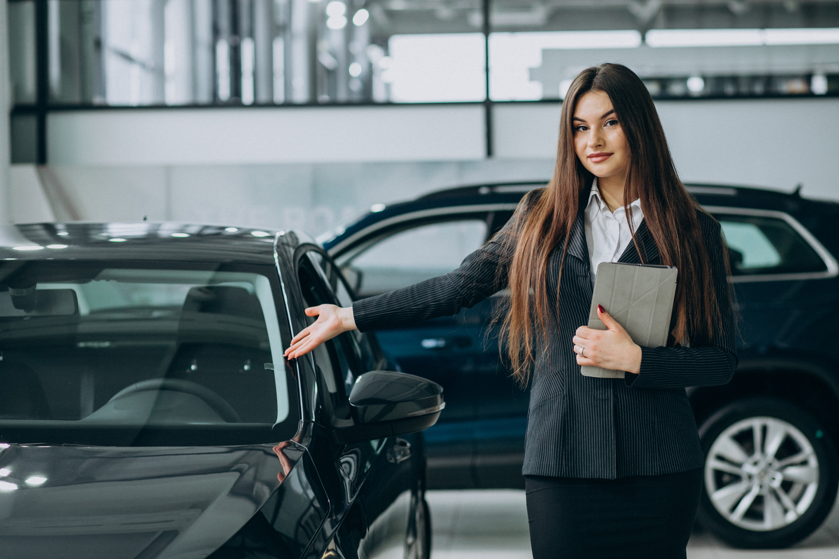 young-sales-woman-carshowroom